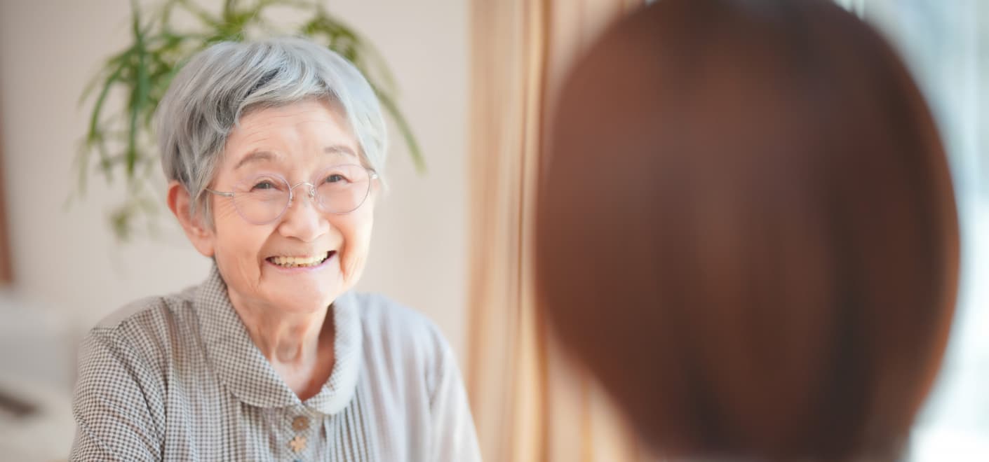 介護福祉を利用する高齢女性の写真
